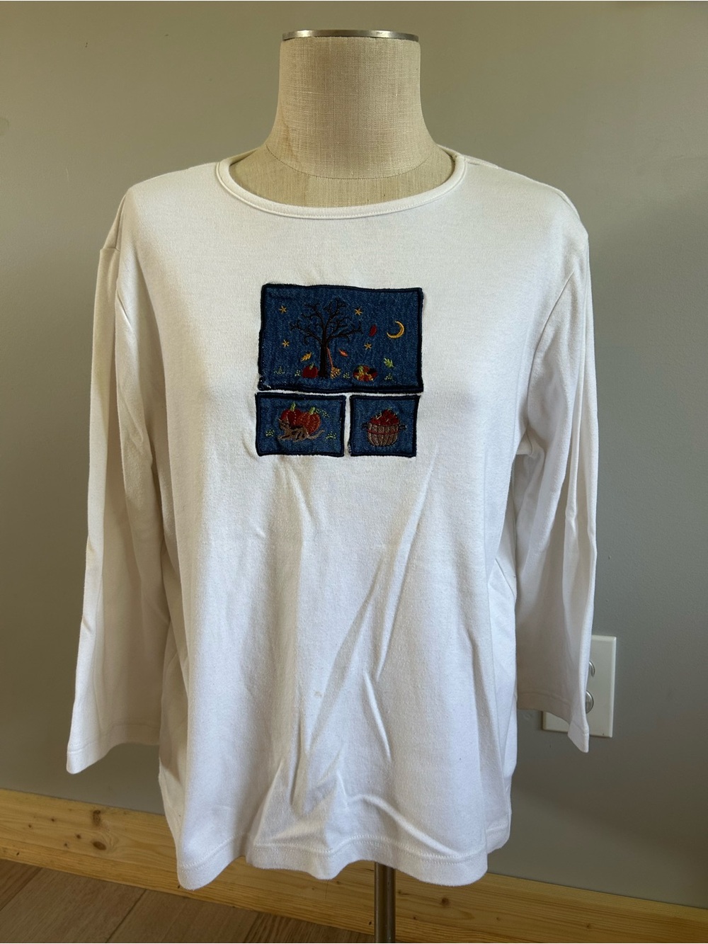 breckenridge White Long Sleeve Top with Blue Embroidered Patch